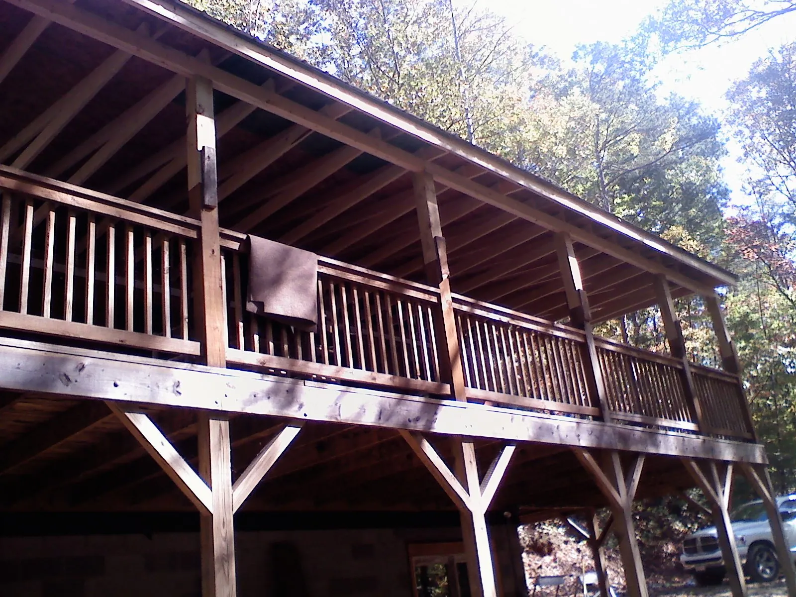 Timber framing under a new elevated porch and deck — Roof Leak Repair in Moravian Falls by Roofing Brothers